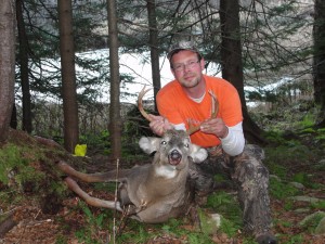 Joe with his 8pt 129lb buck.
